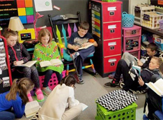 Students reading together in a classroom